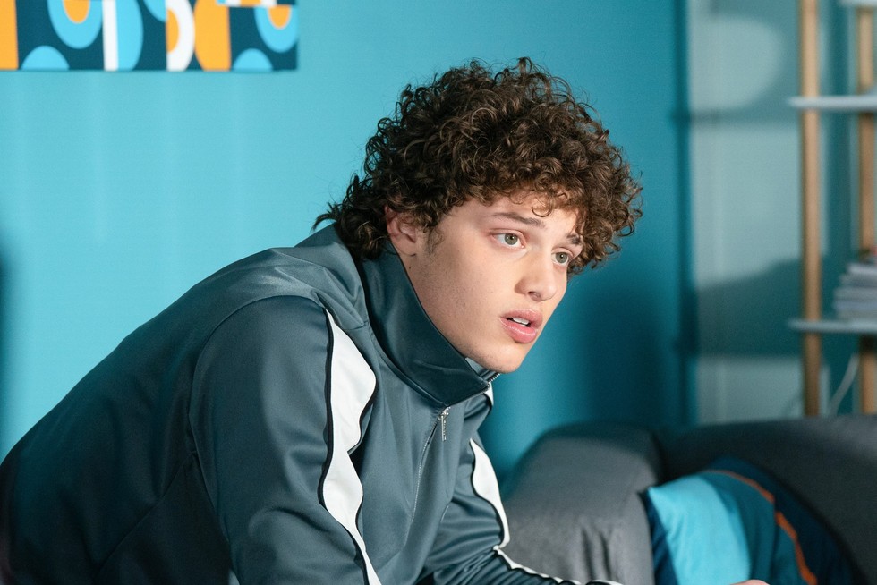 Bobby Brazier as Freddie Slater wearing a tracksuit