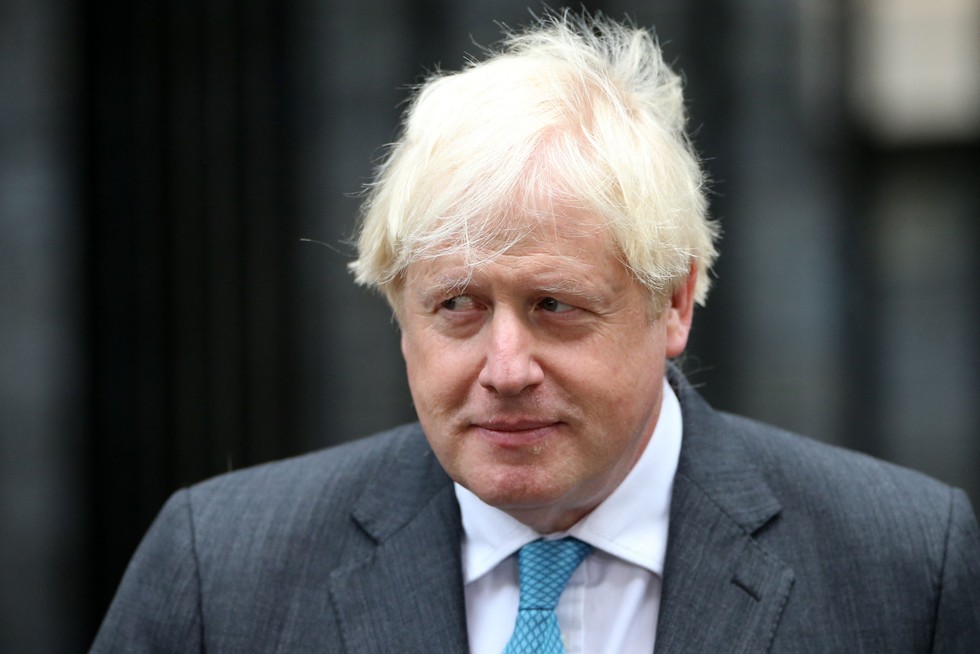 Boris Johnson in a suit and blue tie