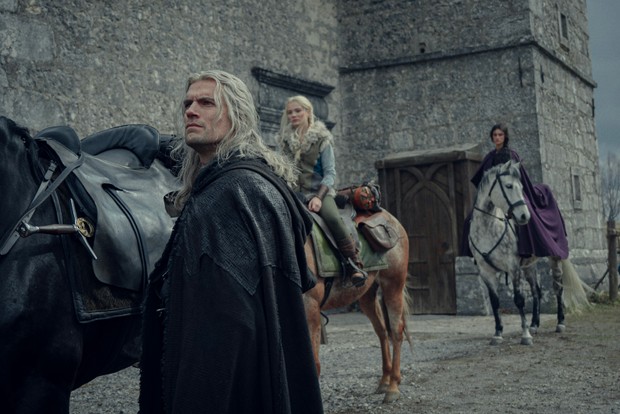 Henry Cavill, Freya Allan and Anya Chalotra in The Witcher season 3, alongside some horses