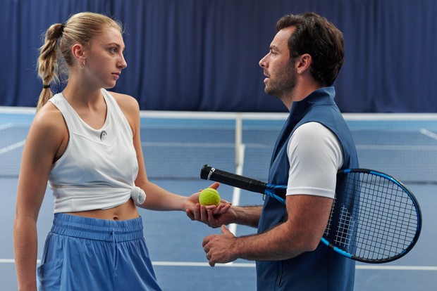 Aidan Turner in Fifteen-Love, holding a tennis ball and racquet and talking to his Ella Lily Hyland