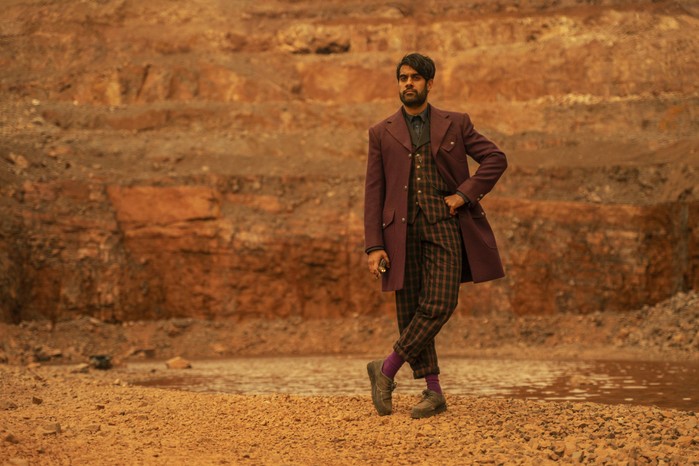 Sacha Dhawan as The Master in Doctor Who, with his hand on his hip