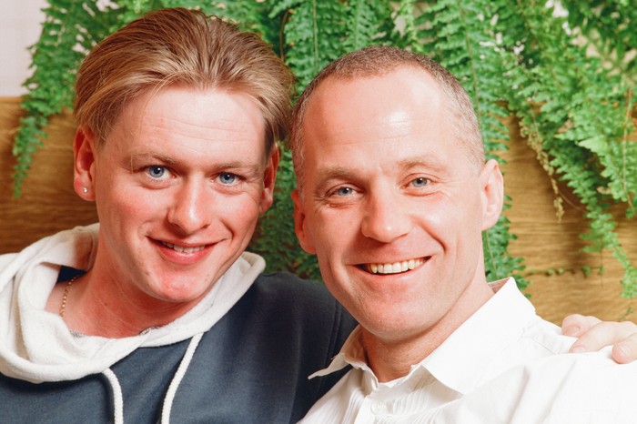Michael Cashman, actor and partner Paul Cottingham, pictured at home together in Bow, east London, 24th April 1990.