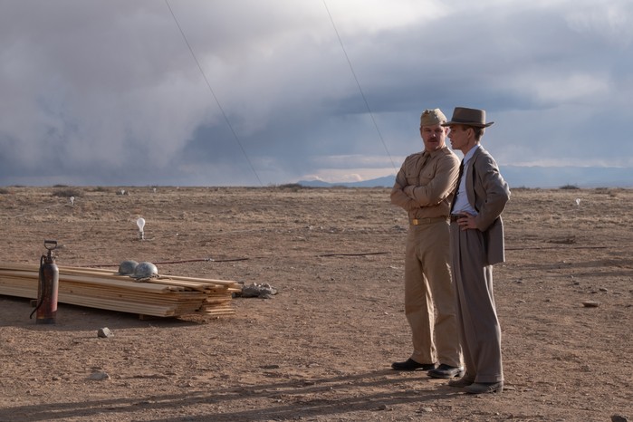 Matt Damon and Cillian Murphy standing in a desert