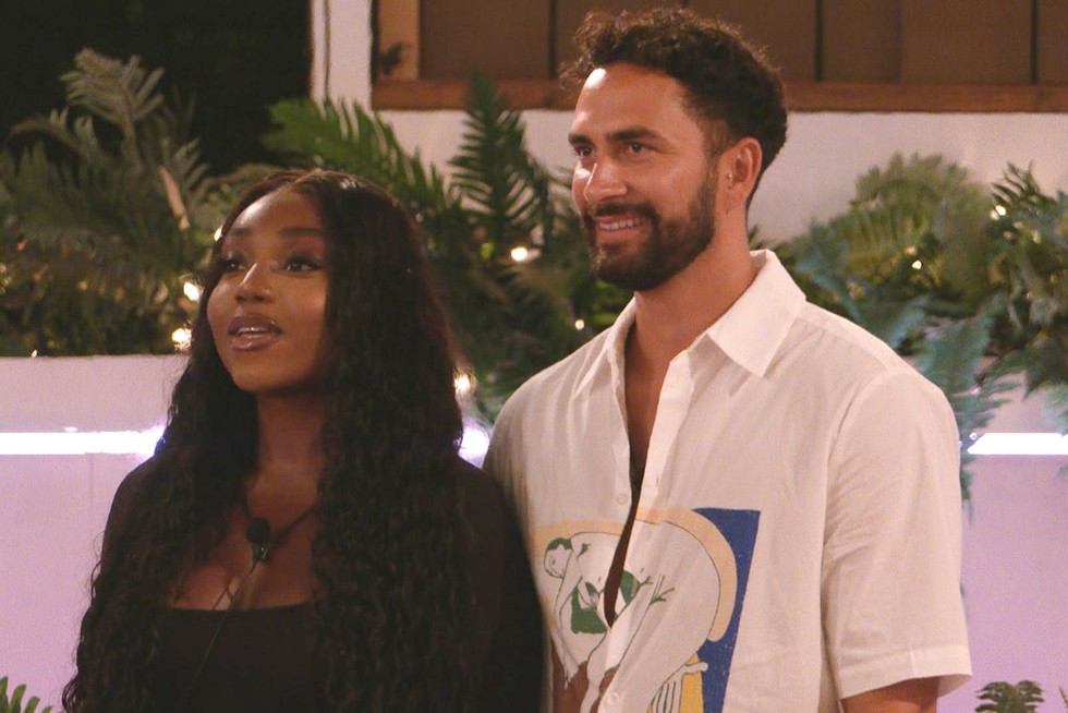 Whitney and Lochan in Love Island, standing next to each other