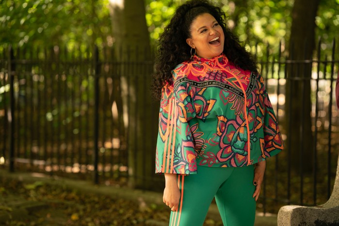 Michelle Buteau as Mavis in Survival of the Thickest, wearing a colourful outfit